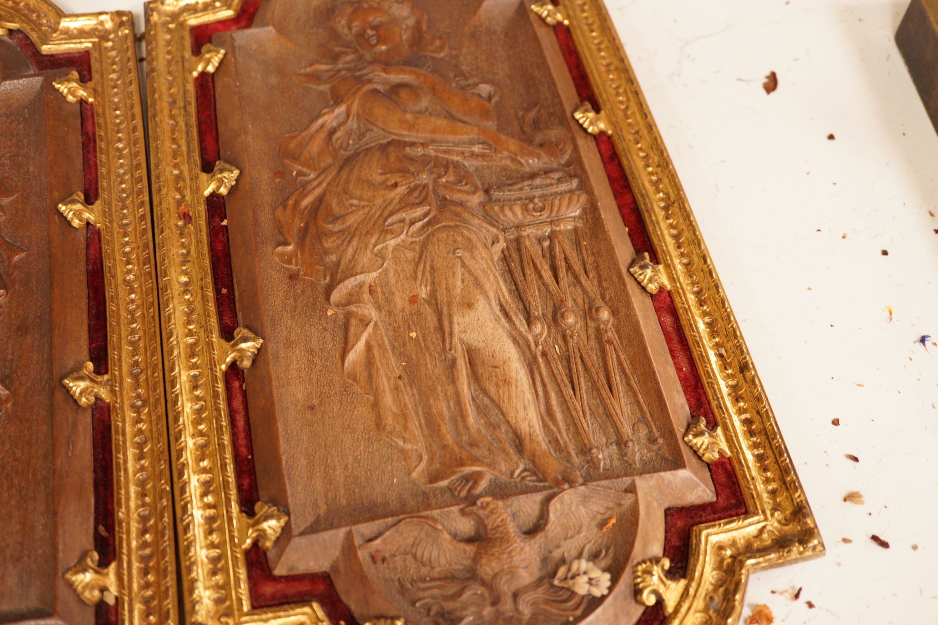 A pair of 19th century French ormolu mounted bois durci plaques, 50cm